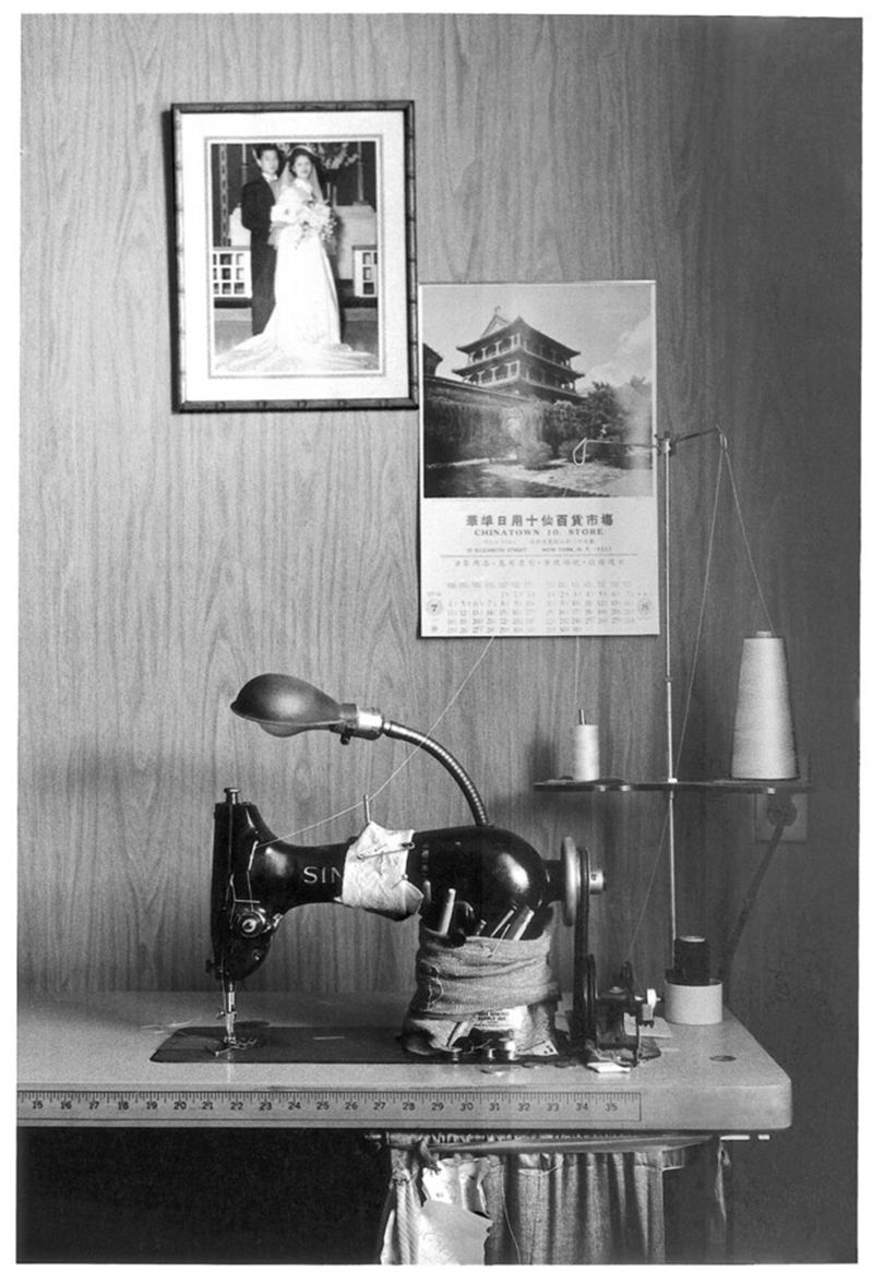 Lee's mother's industrial Singer sewing machine, on which she sewed the work she took home from the garment factory. NYC, 1976.