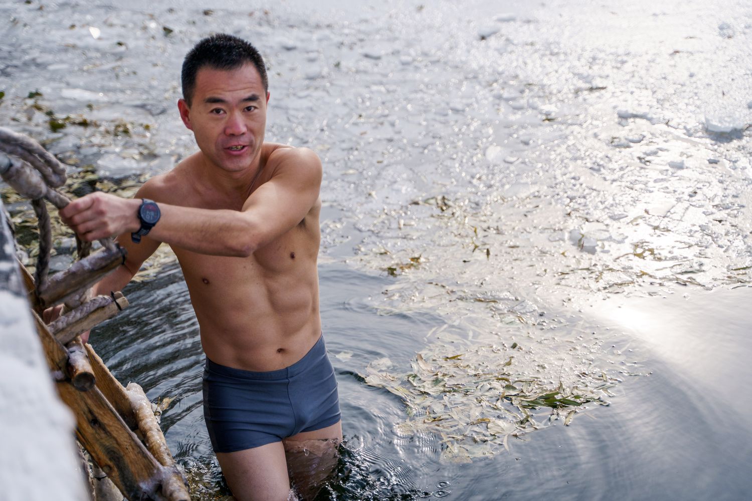 A man in cold water, First snow in Beijing in 2023