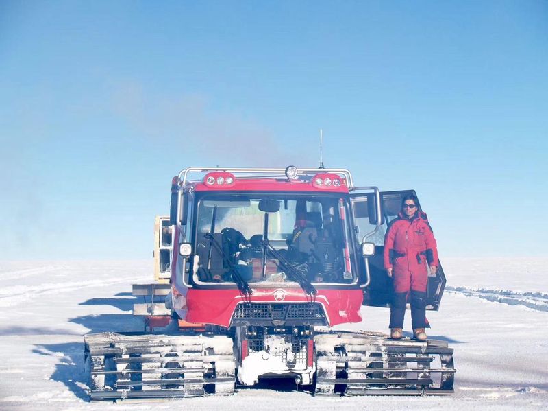 Chinese Antarctic expedition member Cao Jianxi with his snowmobile