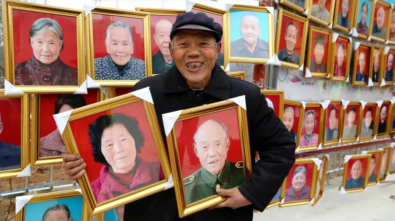 Chinese grandpa poses with his portrait
