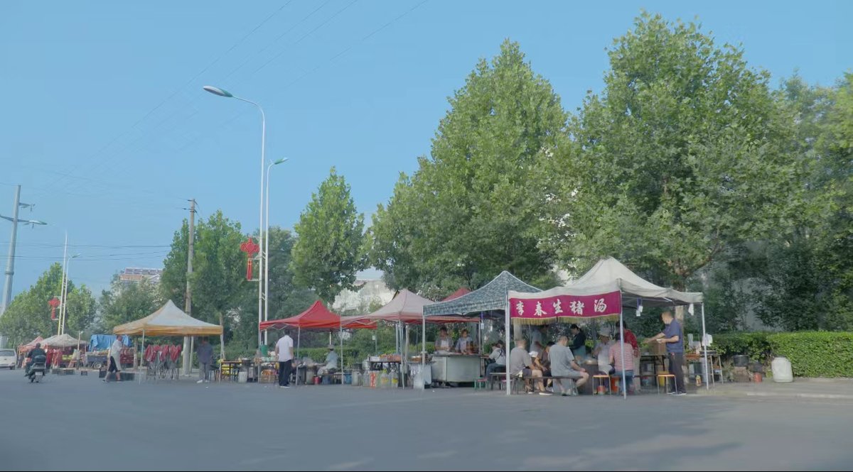 A breakfast stand under a tree