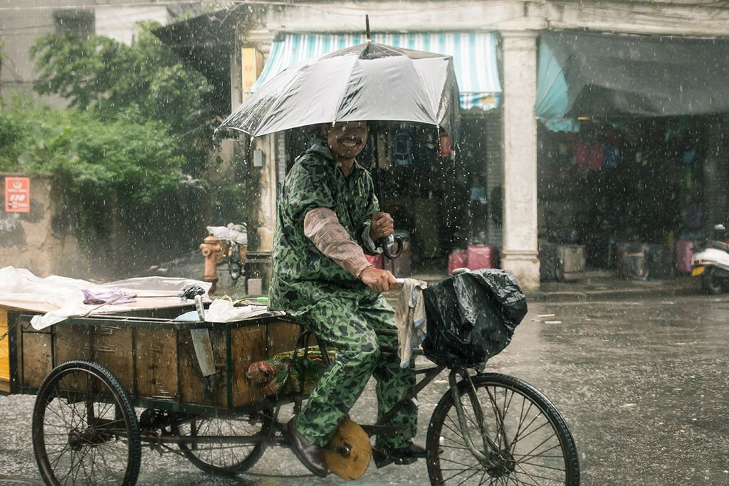 trash collector on tricycle in China