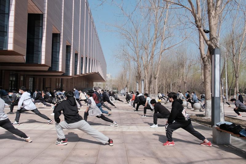 Students stuck on campus exercising together
