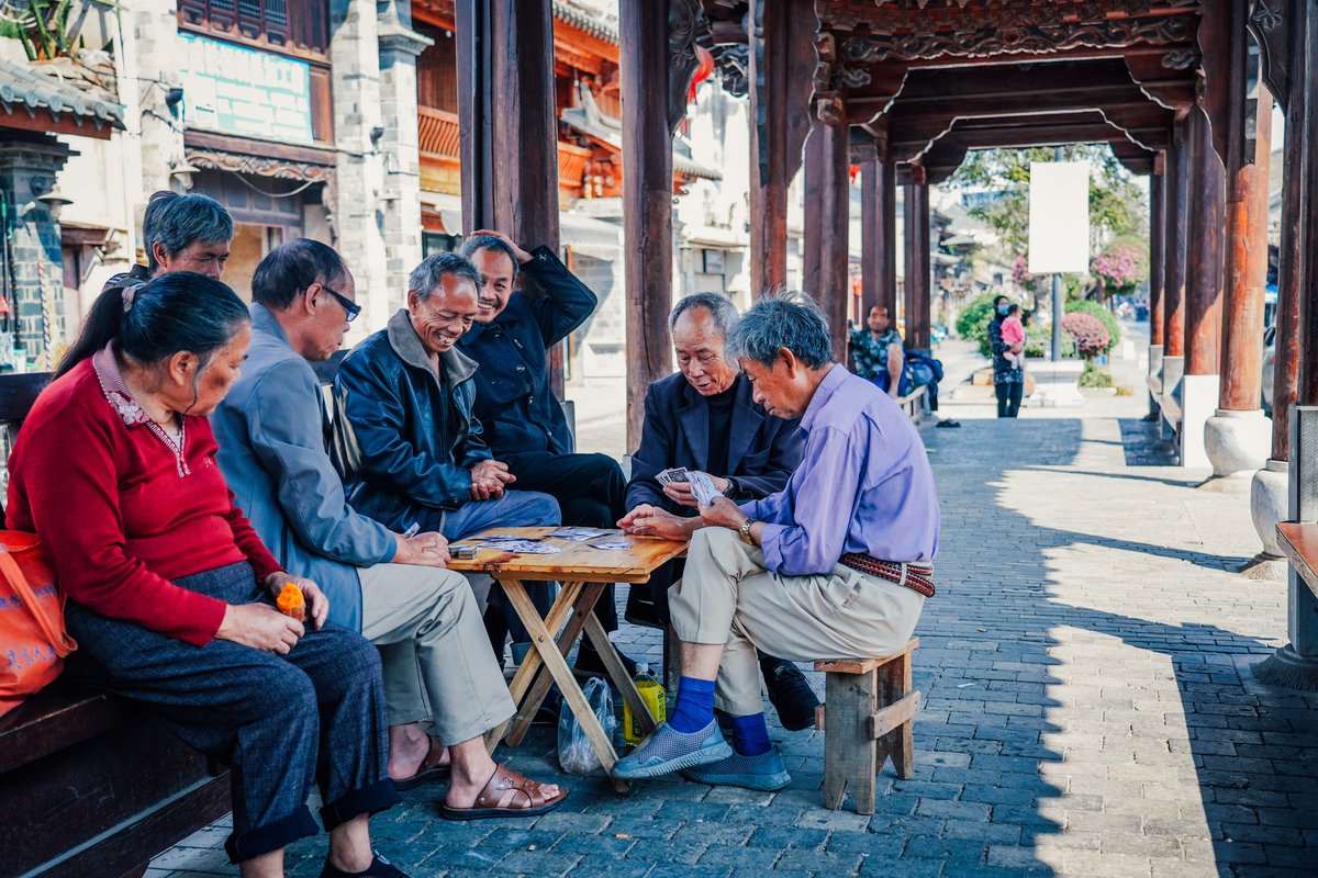 local past-time, playing cards, traveling in Yunnan