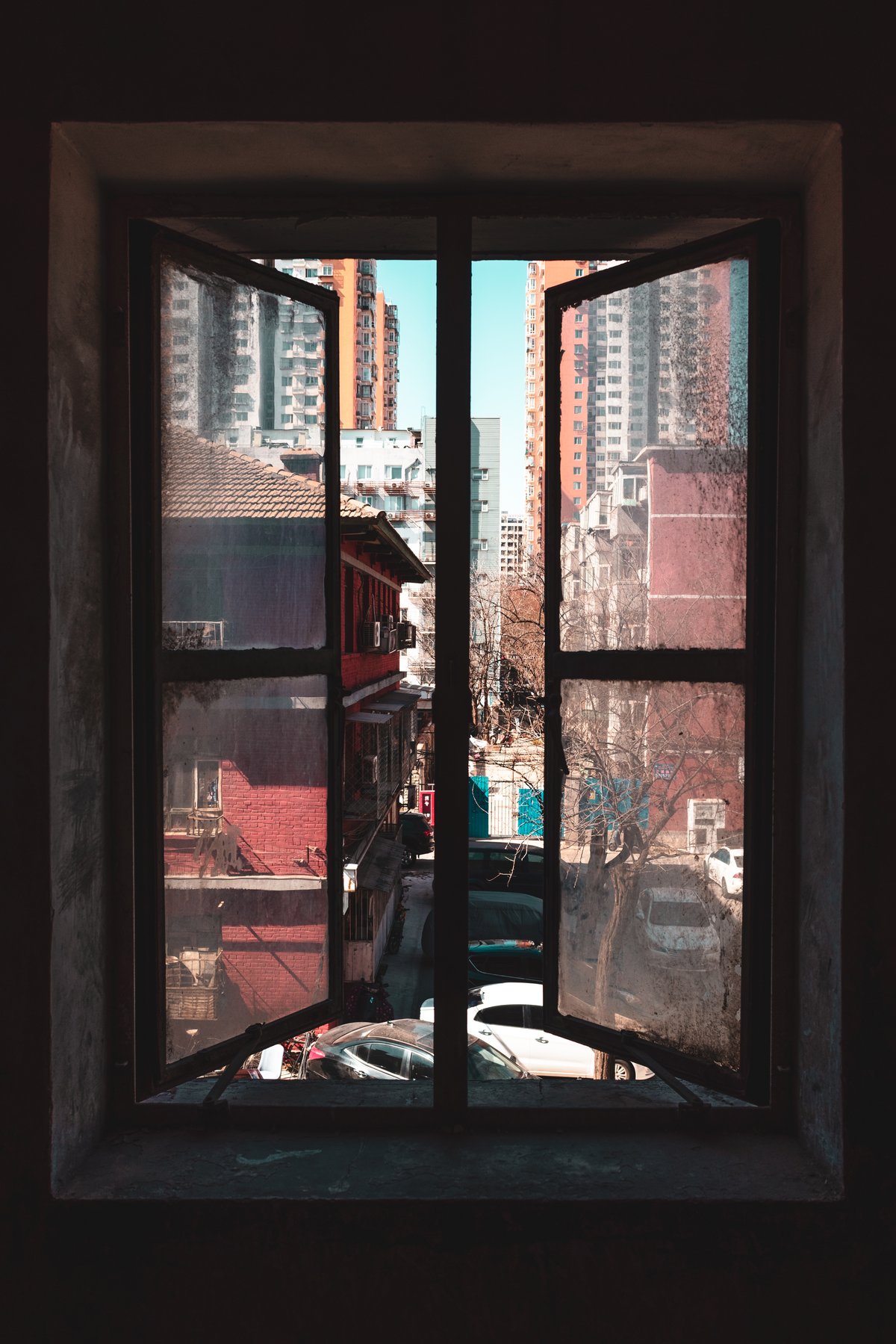 Mostly constructed in the 1950s, three-story residential buildings with red walls are among the oldest apartment blocks in Beijing.