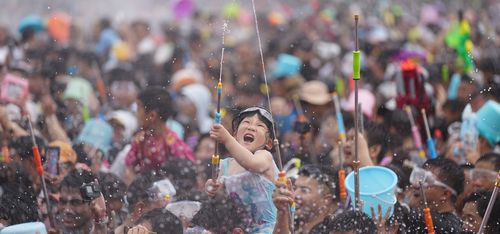 2025_Water_Splashing_Festival_in_Mangshi_VCG111.original