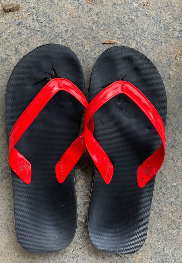 After days of trekking, Guo footprints were etched deeply into the soles of the slippers