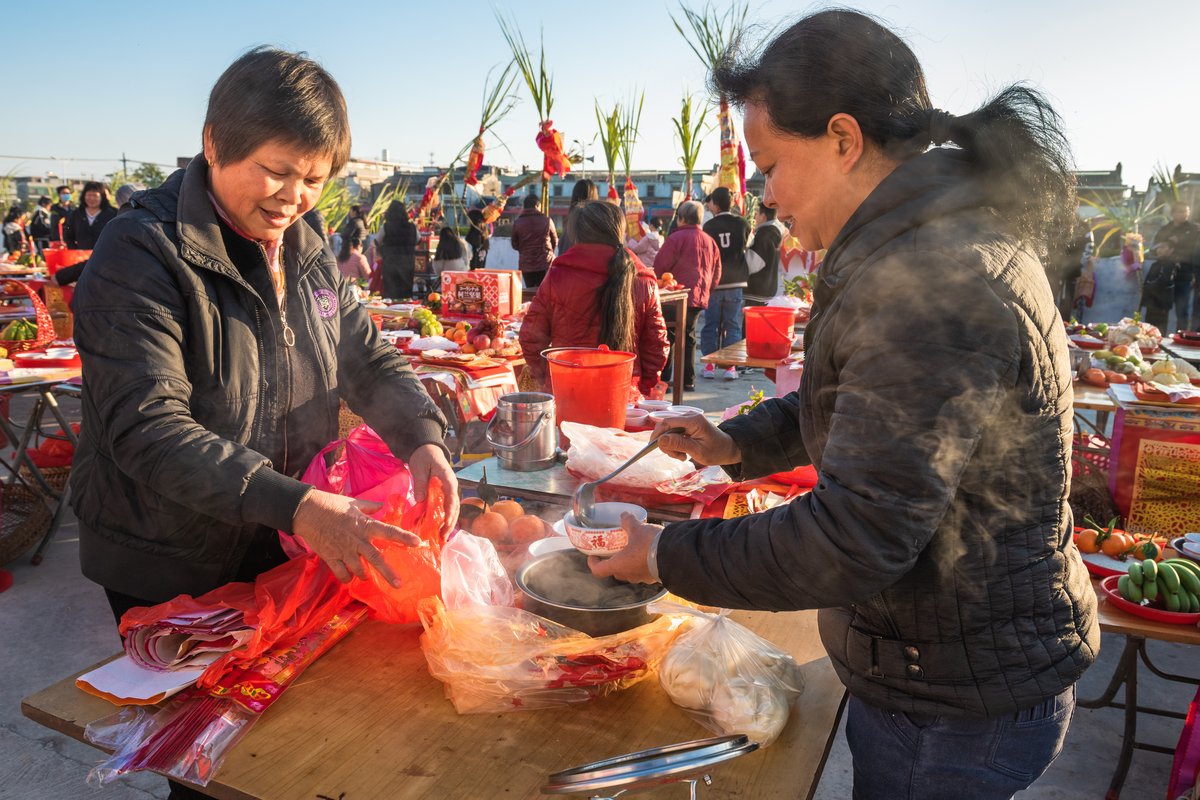 Women are often tasked with preparing offerings for the ritual