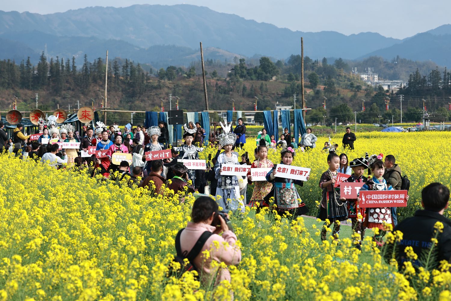 Kaili village models appeared at another show in Rongjiang county, among the rape flower fields, this March before their trip to China Fashion Week in Beijing