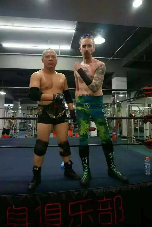 Liu Xuanzheng (left) at MKW’s first-ever pro wrestling match, held in a Dongguan gym in 2015