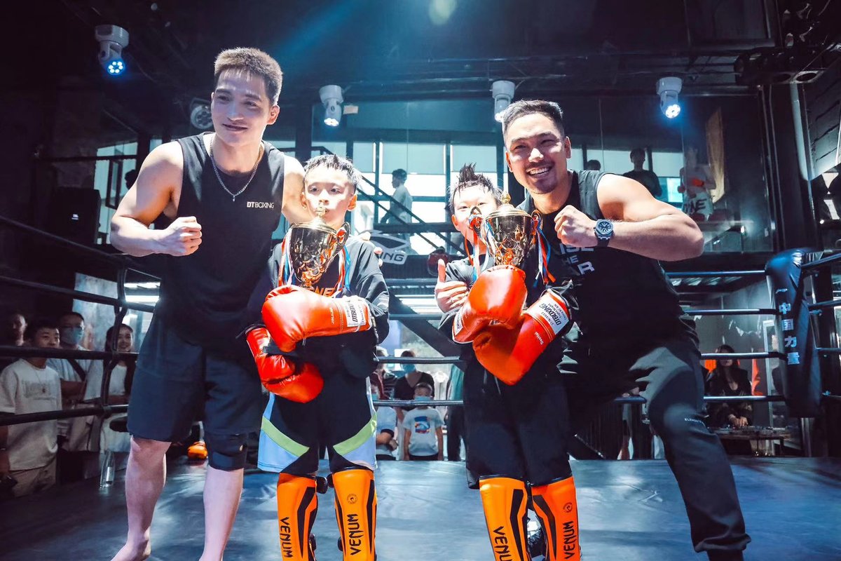 DT Boxing Club in Xi'an, boxing coaches with their students