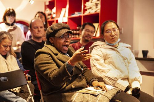 Audience member laughing during the sold-out  "China Story" event.