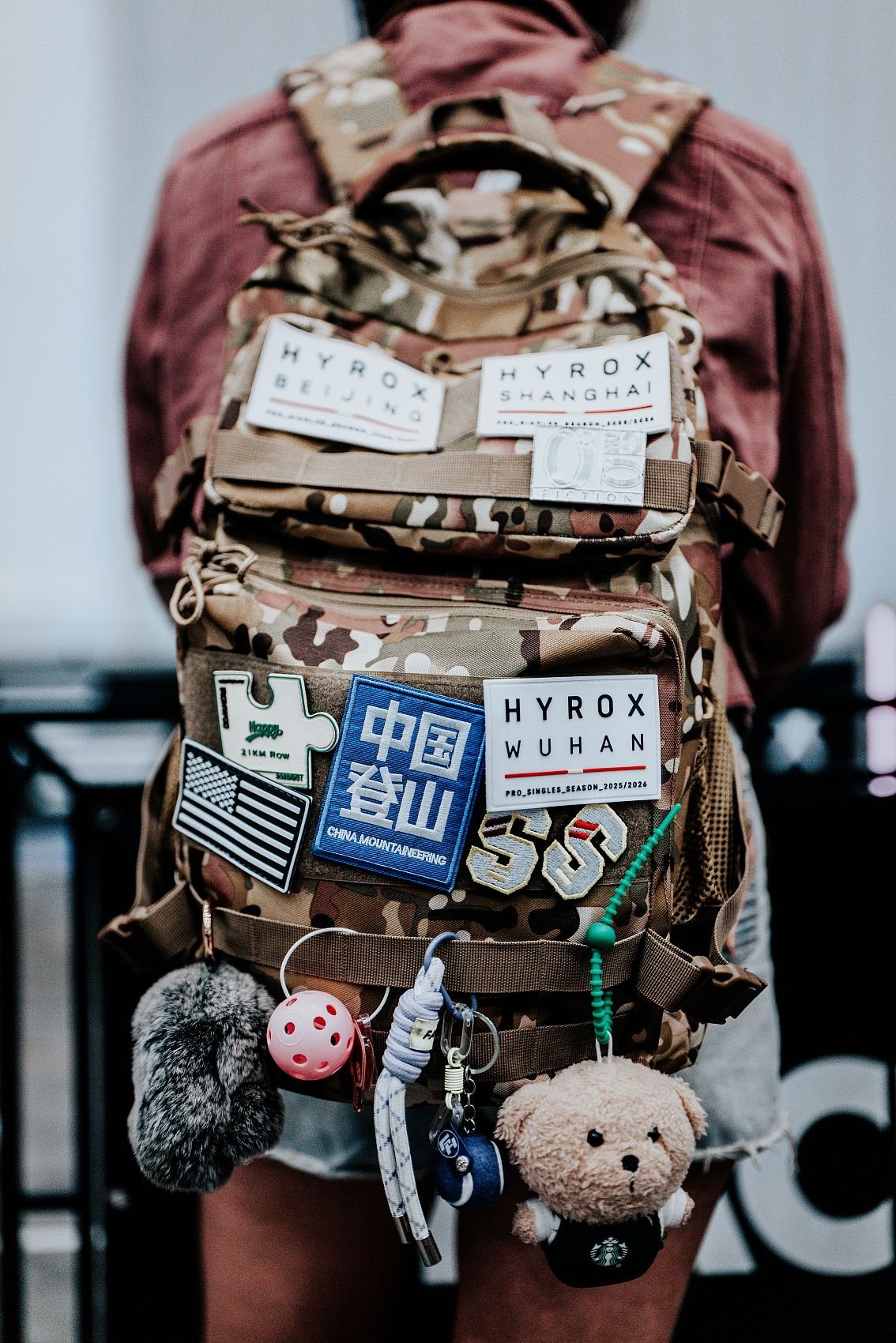 A sports and fitness fan shows off memorabilia from past events