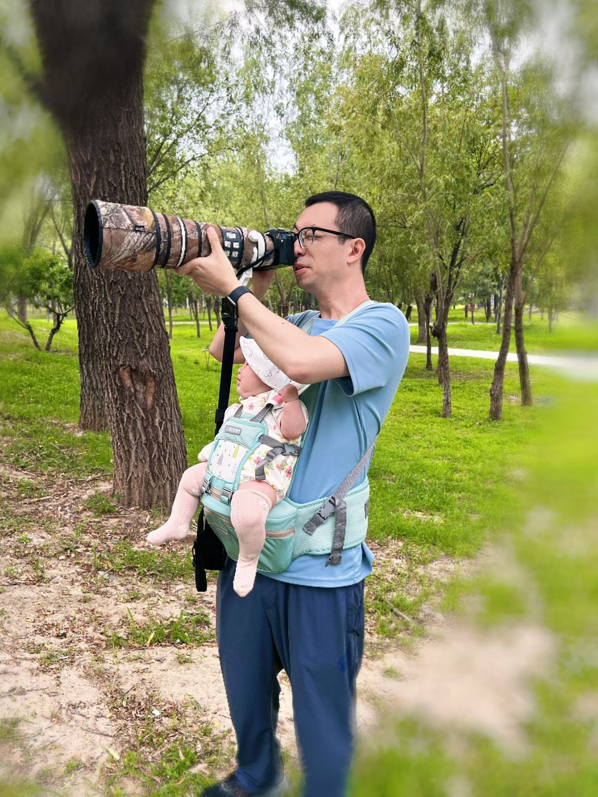 Wang Pan likes to take his infant daughter on birdwatching trips
