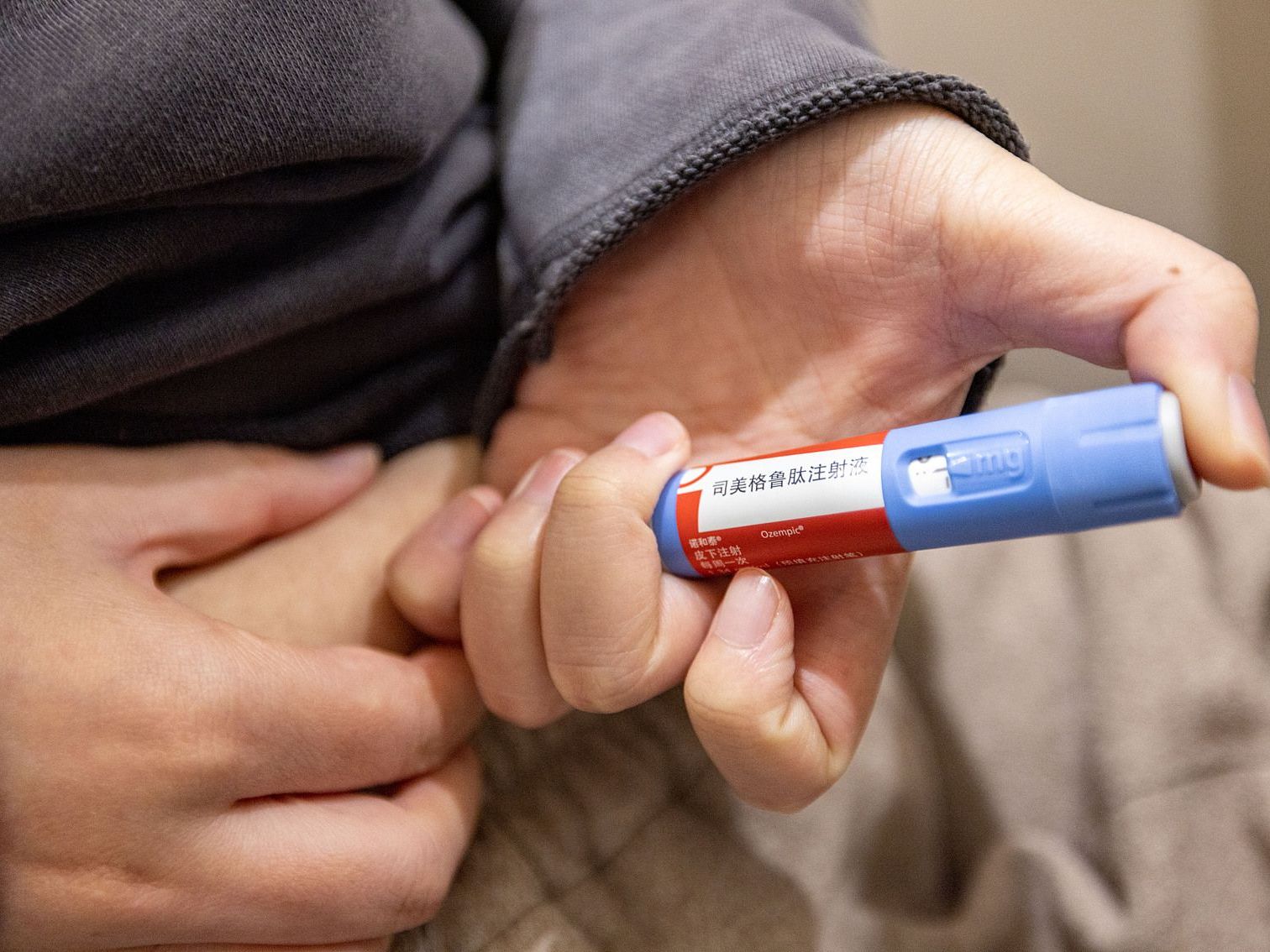 Chinese patient injecting weight-loss medication