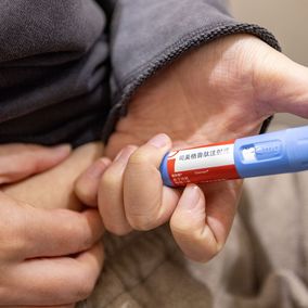 Chinese patient injecting weight-loss medication
