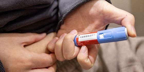 Chinese patient injecting weight-loss medication
