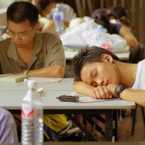 Chinese student napping_VCG1114969