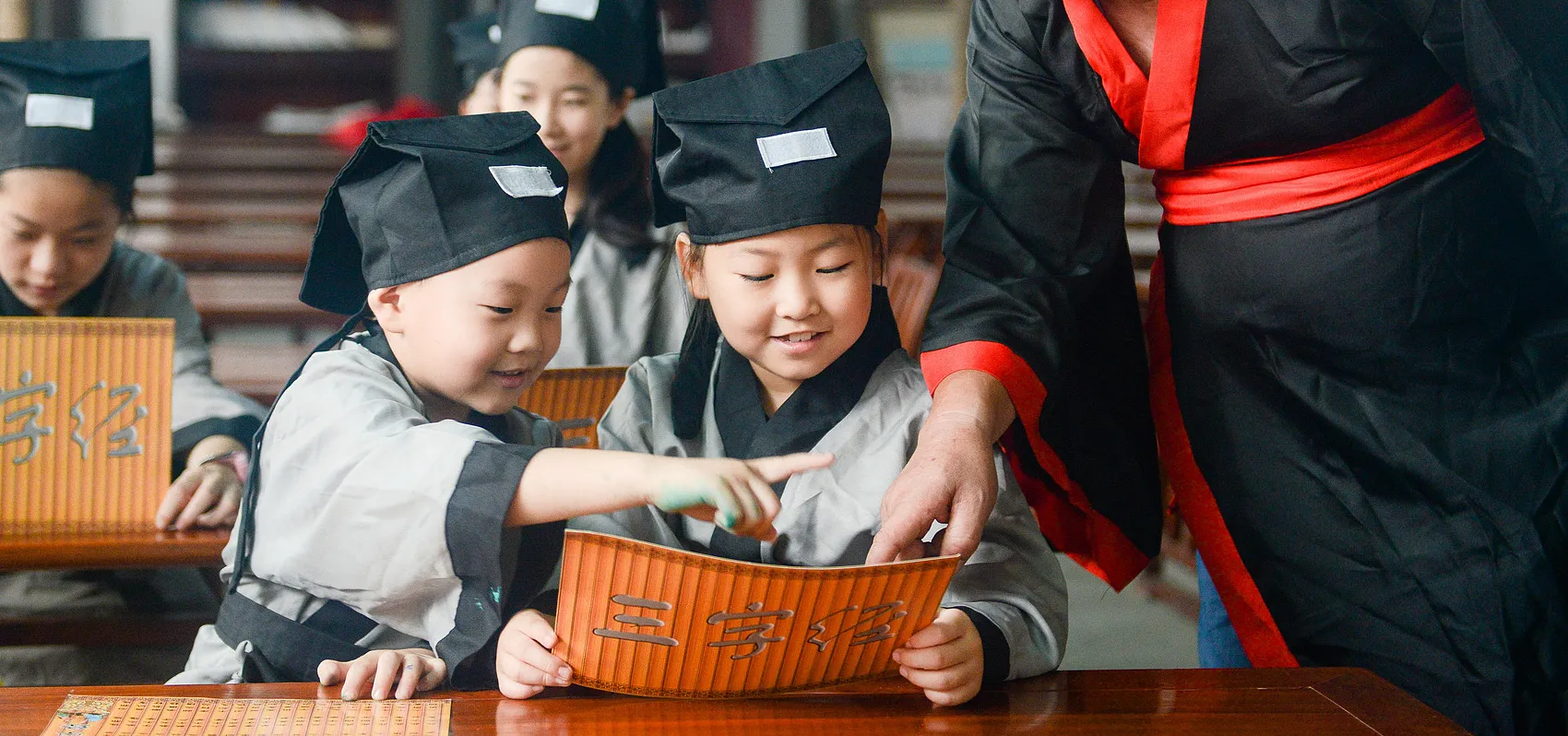 Chinese students studying Chinese with a teacher in Zhejiang