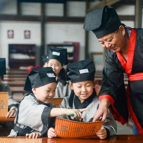 Chinese students studying Chinese with a teacher in Zhejiang