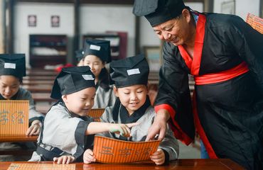 Chinese students studying Chinese with a teacher in Zhejiang