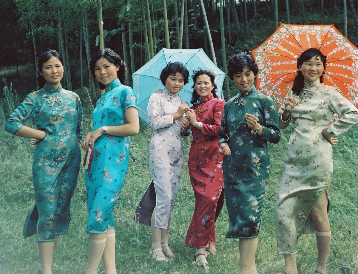In 1987, a group of textile workers modeled for their factory’s qipao products set for the American market