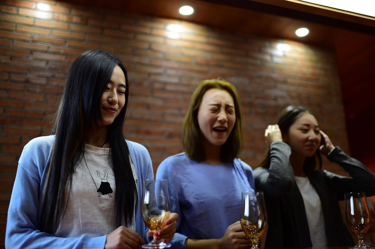 A group of visitors sampling the vinegar in Shanxi