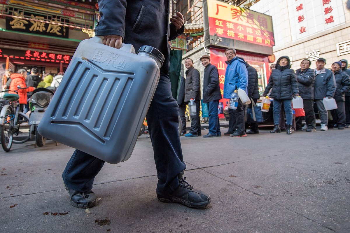 Locals in Taiyuan, Shanxi waiting in line to buy vinegar.