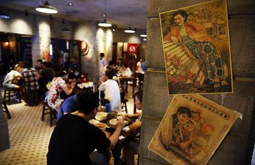 Customers eating Shanghai cuisine