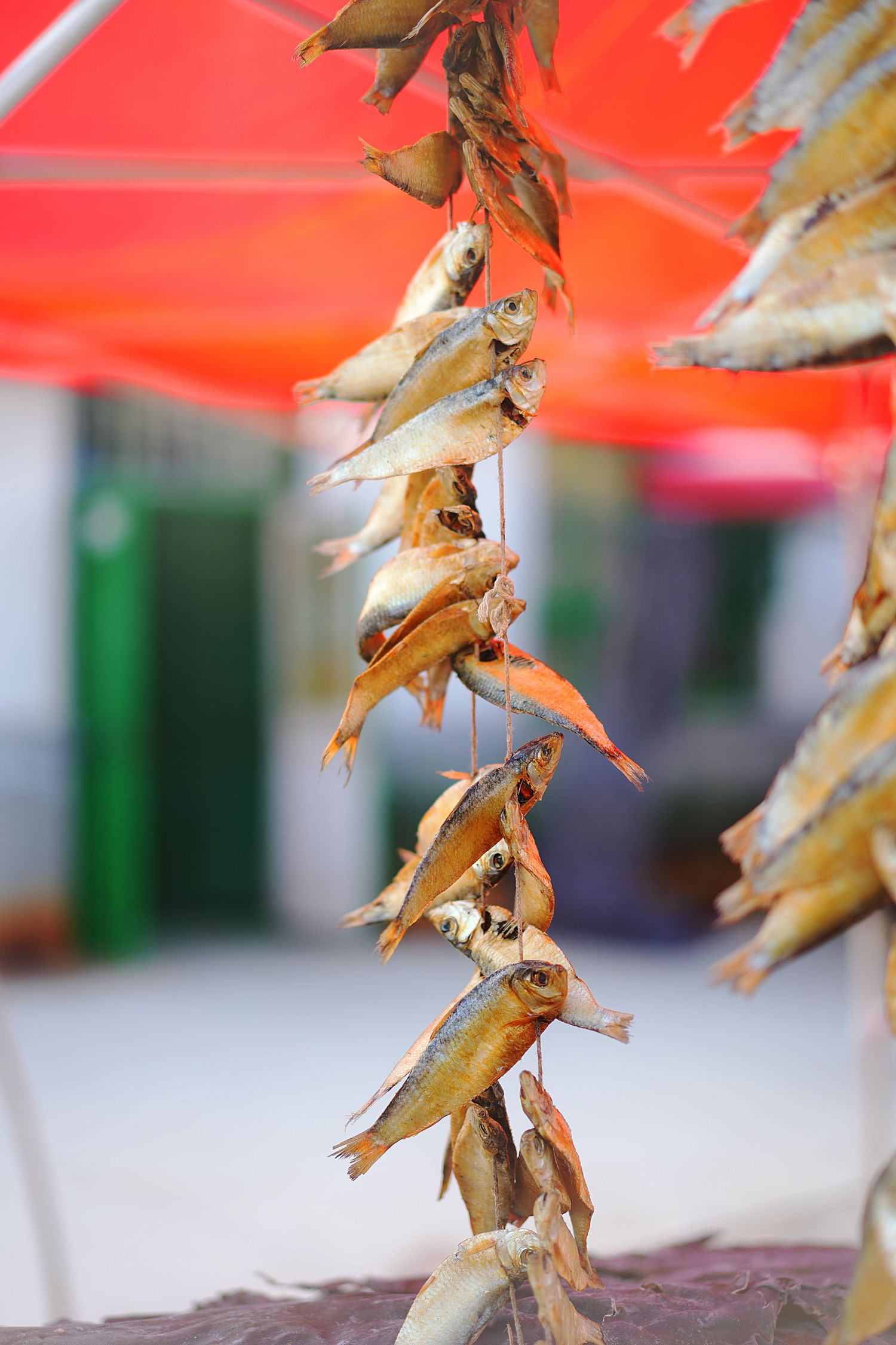 Dried fish and other seafood are common goods hang from many stalls in Shandong’s many coastal towns