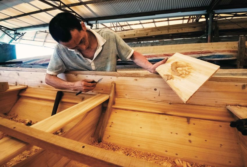 While joinery holds the bulk of the boat together, glue is also used in the production process