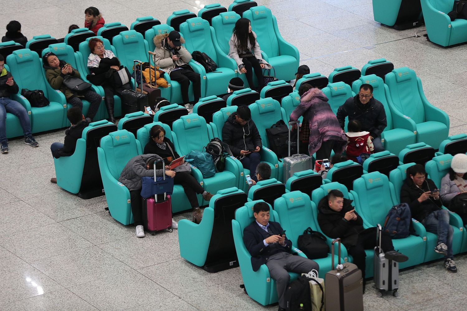A train station in Dalian with updated massage chairs that also charge phones