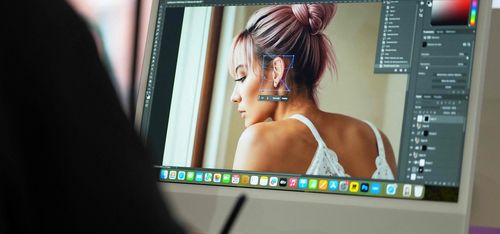 Designer editing an AI generated image