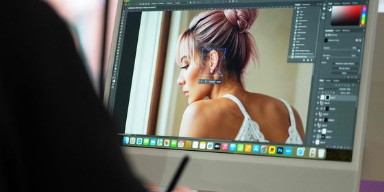 Designer editing an AI generated image