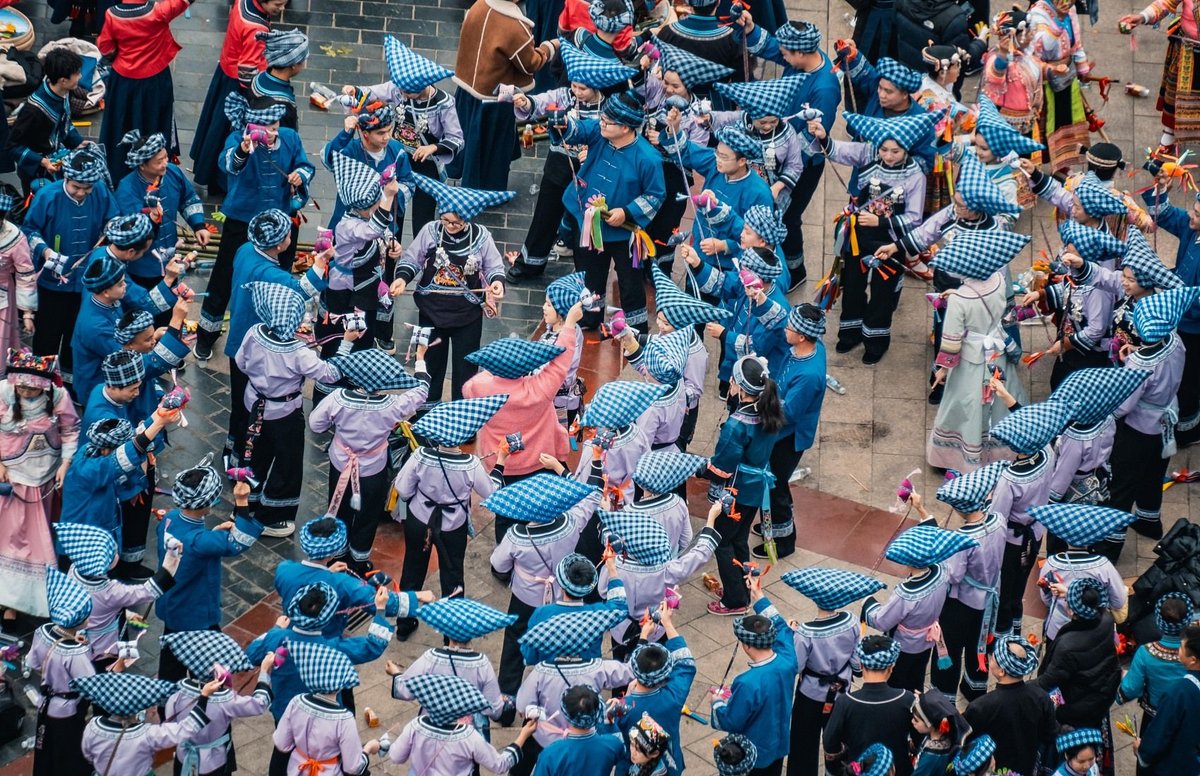 The Chaff Bag Dance (or Flower Bag Dance) is a traditional celebration of the Bouyei ethnic group, where dancers toss and catch colorful small chaff bags in a lively and coordinated display