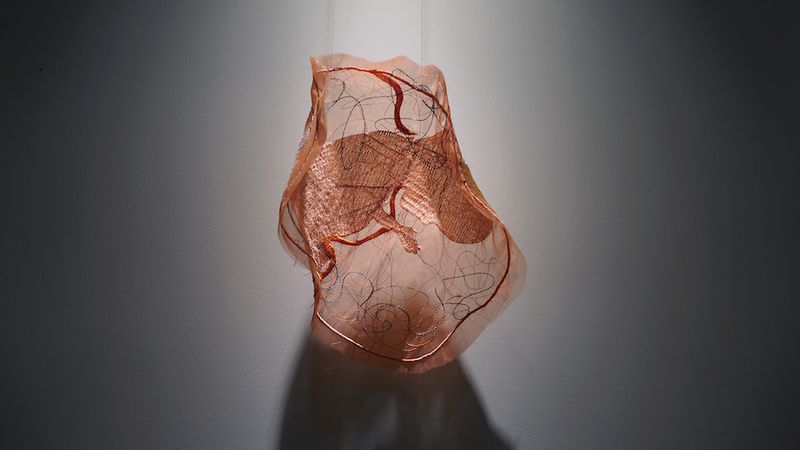 Chinese fiber artist Yue Mingyue's, “From Womb to Tomb,” gauze and thread, 2019