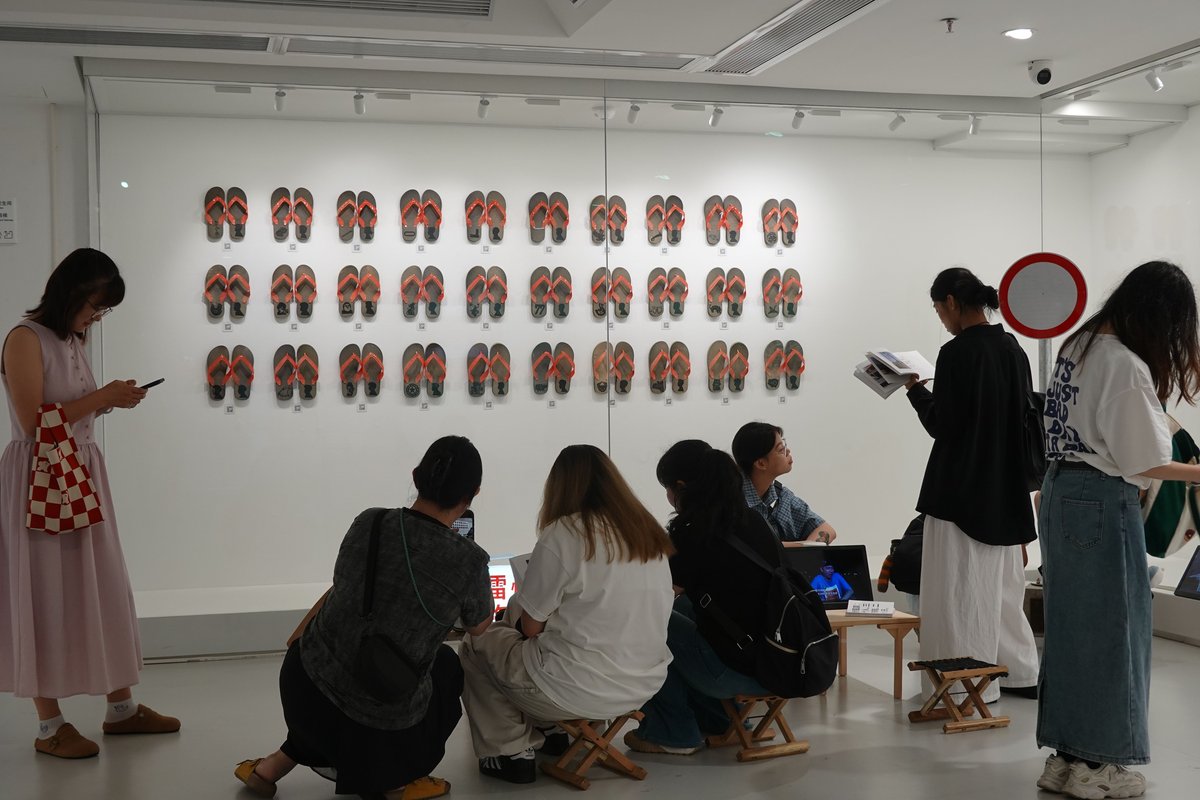 Audiences lingered, taking time to carefully explore every element of Guo’s Leizhou Slippers multimedia installation, China's king of slippers