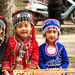 Hani children eating at Long Street Banquet