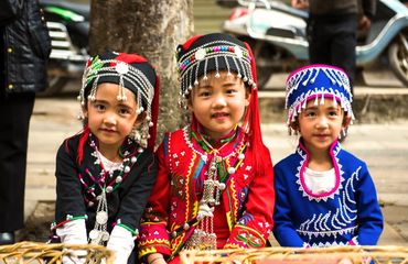 Hani children eating at Long Street Banquet