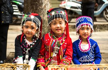 Hani children eating at Long Street Banquet