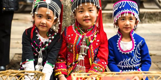 Hani children eating at Long Street Banquet