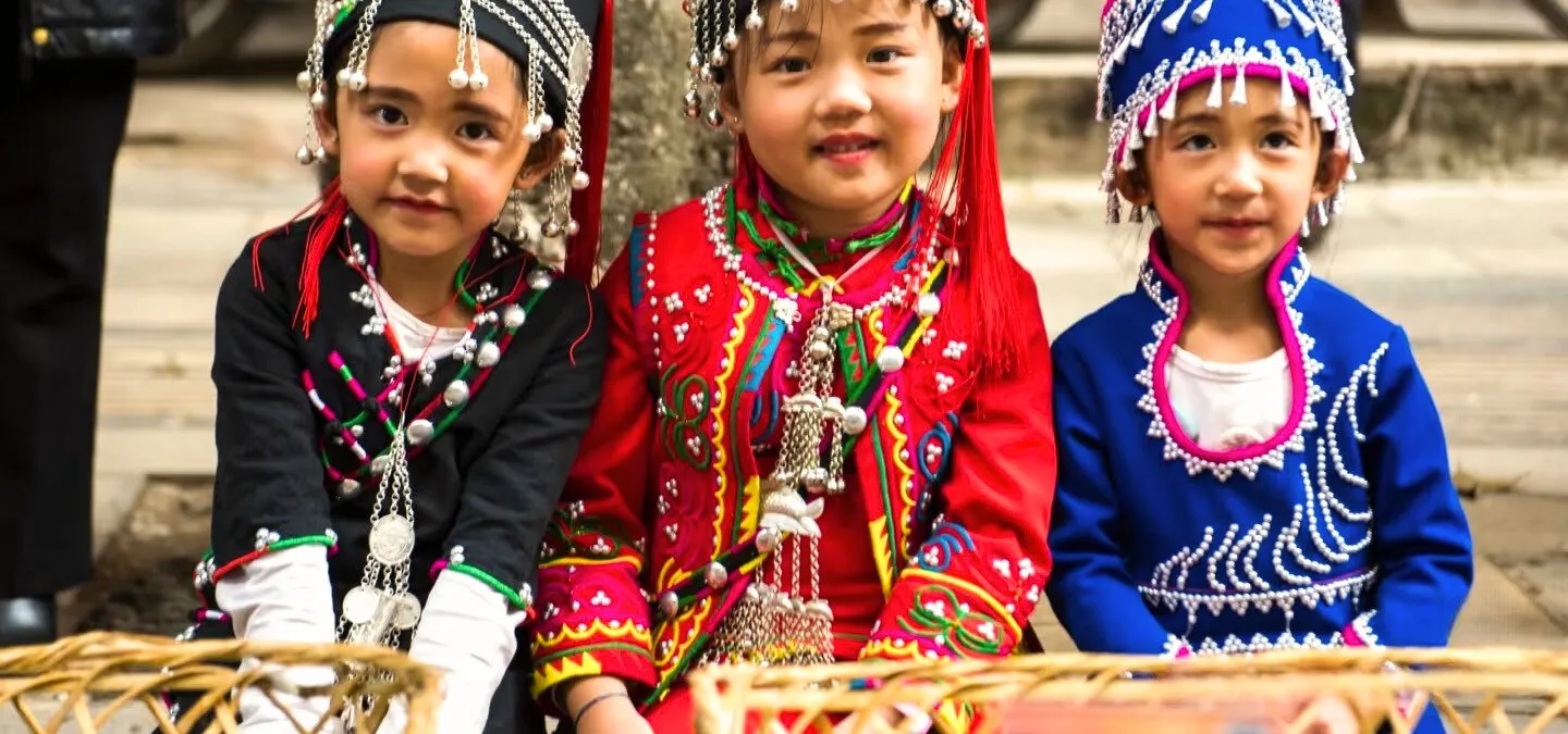 Hani children eating at Long Street Banquet