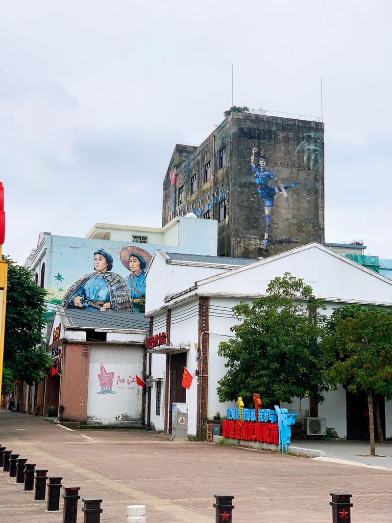 Murals depicting scenes from The Red Detachment of Women can be found in the central parts of the island