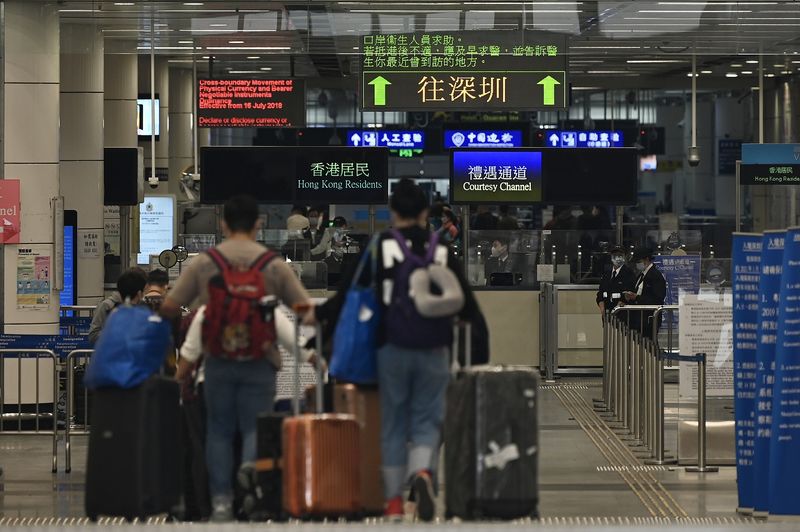 Hong Kong residents and travelers getting ready to board a train to Shenzhen, Guangdong