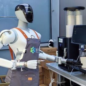 Humanoid robot in Shenzhen makes coffee