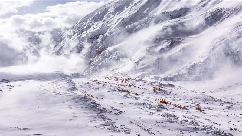 Climbers face heavy winds and extreme weather atop Mount Everest