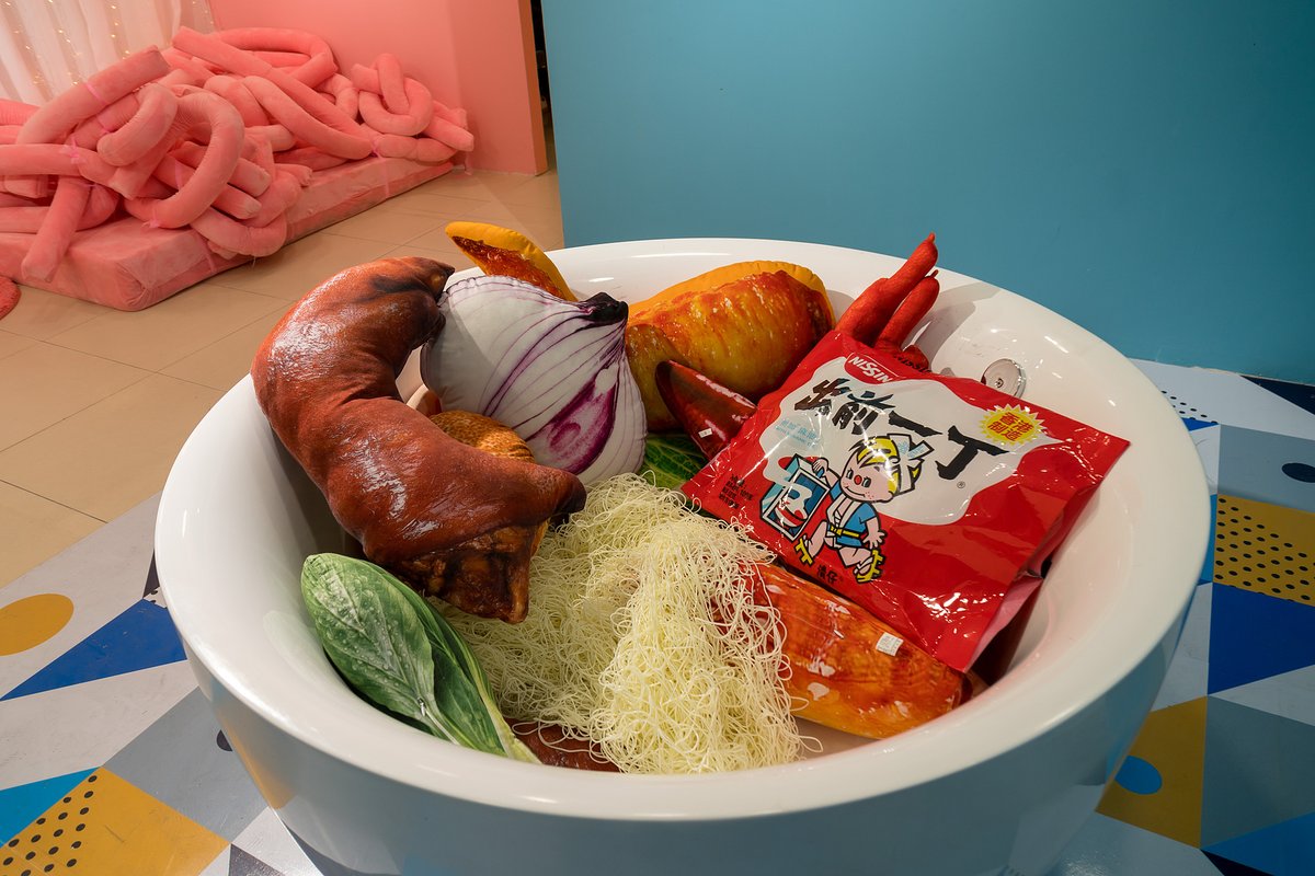 A display at the "Lonely Instant Noodles" in Shanghai shows how to mix other ingredients with instant noodles at home