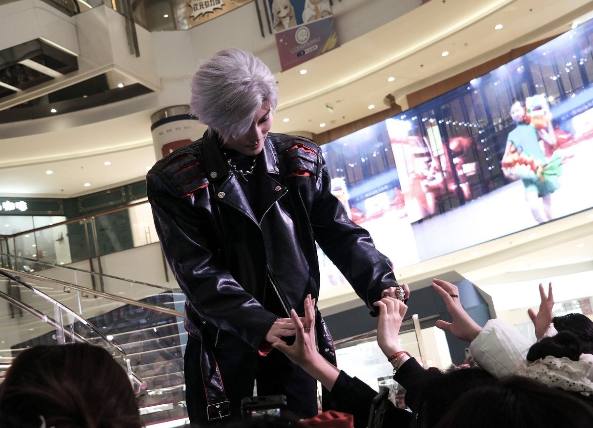 At a 2024 Love and Deepspace pop-up event in Jiangsu, cosplayers dressed as characters from the game greeted fans and posed for photos, Chinese boycotting Love and Deepspace
