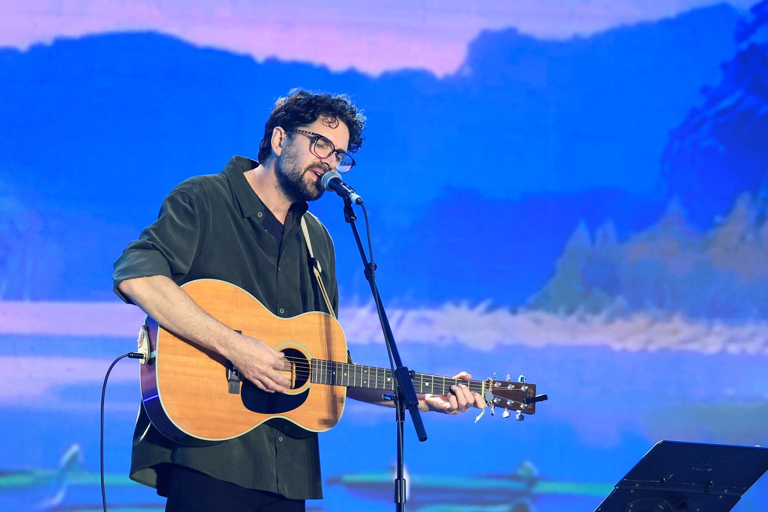 New Zealand musician Luke Thompson performs at the opening ceremony of the arts festival
