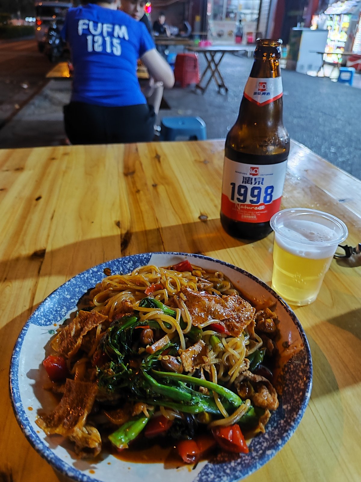 Author eating a bowl of Luosifen noodles